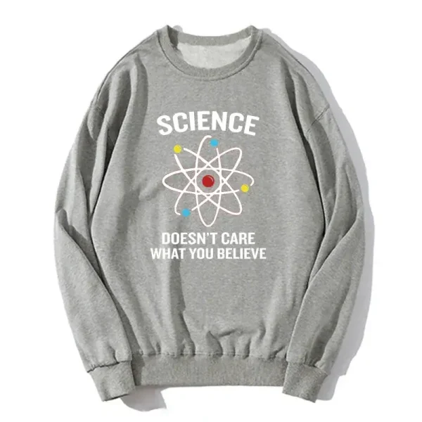 Vetenskaplig tröja med atom-mönster och inspirerande slogan.
