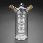 Transparent glasvas i vetenskaplig stil med två korkproppar, designad för dekoration eller experimentering. Perfekt för laboratorie- eller vetenskaplig stil.