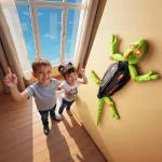 Interaktiv grodrobot för barn, pedagogisk och rolig, fäst vid väggen, med LED-lampor och beröringssensorer, perfekt för att stimulera nyfikenhet och lärande.