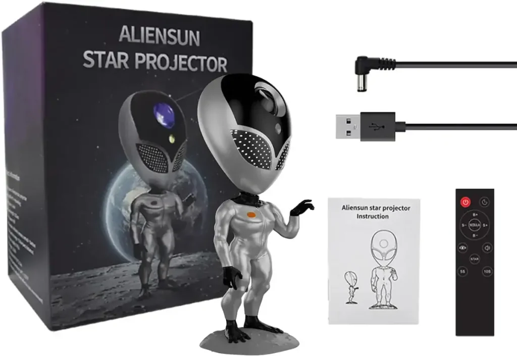 AlienSun stjärnprojektor med utomjordingfigur, USB-kabel och fjärrkontroll, perfekt för vetenskaplig dekoration och kosmisk atmosfär.