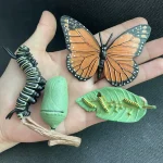 Dekorativa insektsaccessoarer för samling eller dekoration.