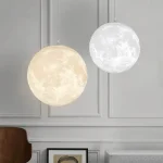 Hängande lampa i form av en måne, stämningsbelysning för inomhusbruk.