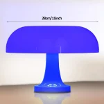 Skrivbordslampa i form av en svamp, blå LED-belysning, modern och originell design för vetenskaplig eller geek-inredning.