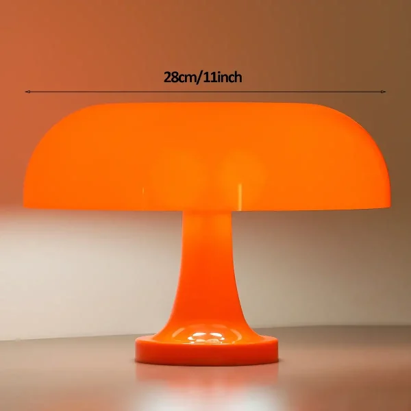 Designad bordslampa i orange, 28 cm, perfekt för inredning och stämningsbelysning.
