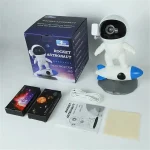 Rymdrobot för barn med galaxprojektor, levereras med låda, USB-kabel, manual och tillbehör, perfekt för lekfullt lärande om rymden.