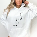Vit hoodie med stiliserat svart DNA-mönster, idealisk för vetenskaps- och vetenskaplig inredning. Bekväm och trendig, perfekt för en avslappnad look.
