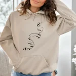 Beige hoodie med stiliserat DNA-mönster, perfekt för vetenskaps- och avslappnad modeentusiaster.