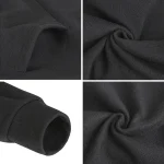 Svart polyester tyg, mjukt och hållbart, idealiskt för skapande av kläder, accessoarer eller inredning. Lätt att arbeta med, ger en elegant och hållbar finish.
