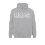 Ljusgrå hoodie med den kemiska formeln "S Ar Ca Sm" och frasen "Primary Elements of Humor" i vitt, modern grafisk stil.
