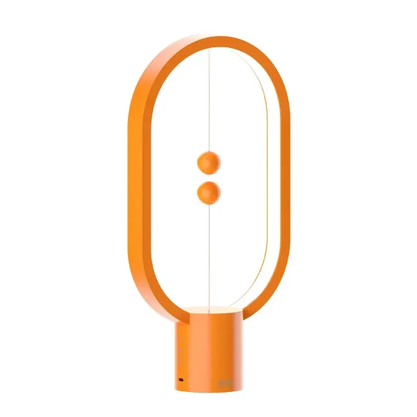 Skrivbordslampa med design i orange oval form med två knappar för belysning.
